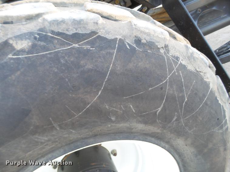 image for item BJ9798 2014 MacDon M205 self-propelled windrower