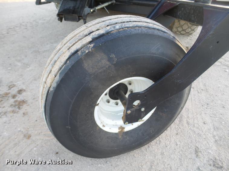 image for item BJ9798 2014 MacDon M205 self-propelled windrower