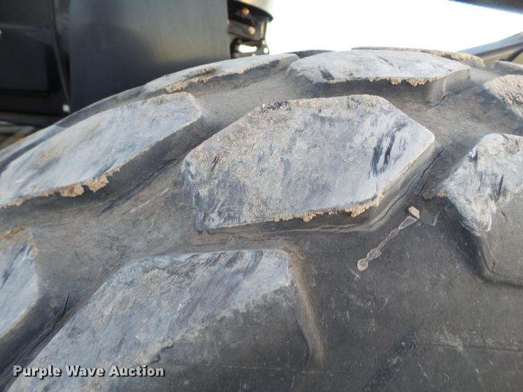 image for item BJ9798 2014 MacDon M205 self-propelled windrower