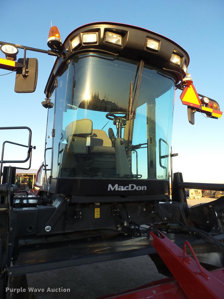 image for item BJ9798 2014 MacDon M205 self-propelled windrower