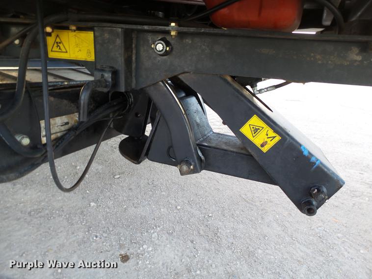 image for item BJ9798 2014 MacDon M205 self-propelled windrower