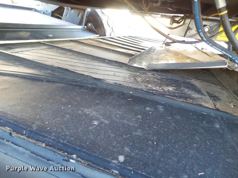 image for item BJ9798 2014 MacDon M205 self-propelled windrower