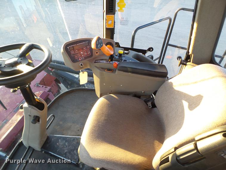 image for item BJ9798 2014 MacDon M205 self-propelled windrower