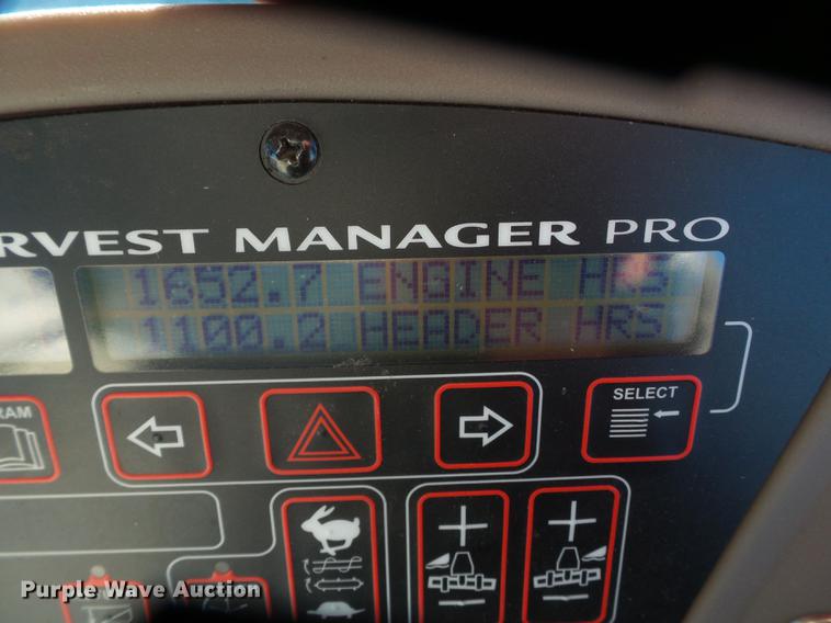 image for item BJ9798 2014 MacDon M205 self-propelled windrower