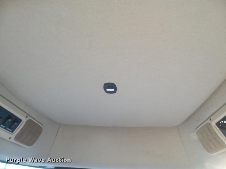 image for item BJ9798 2014 MacDon M205 self-propelled windrower