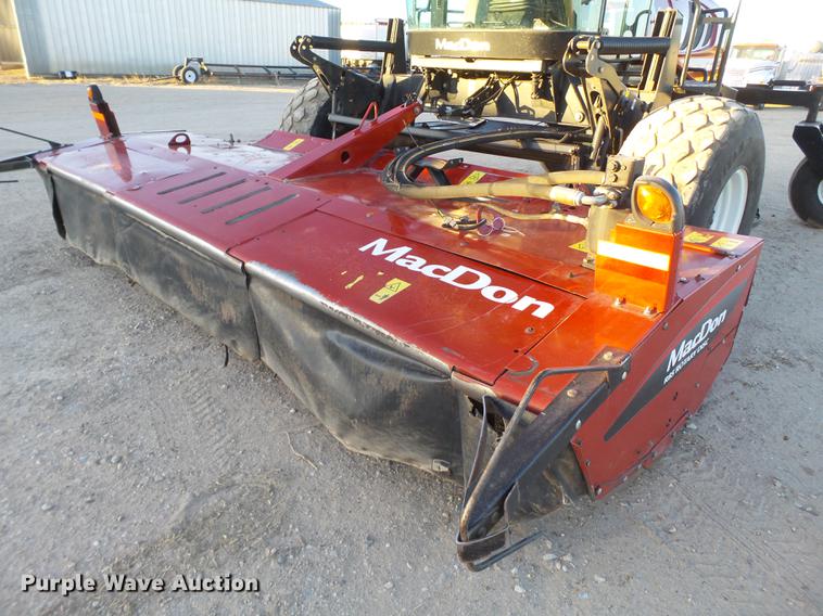 image for item BJ9798 2014 MacDon M205 self-propelled windrower
