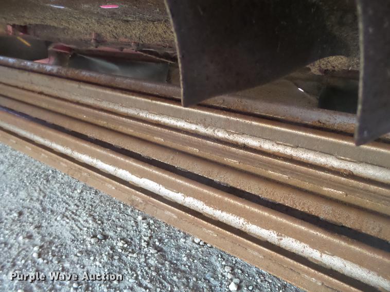 image for item BJ9798 2014 MacDon M205 self-propelled windrower