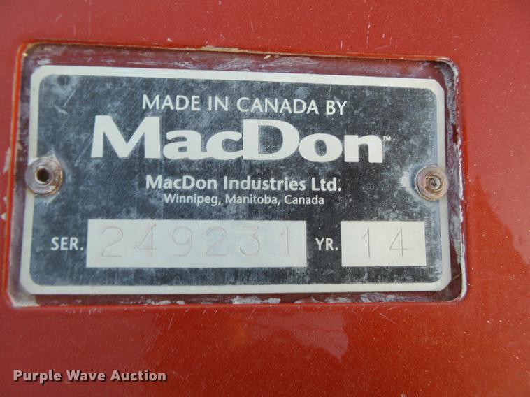 image for item BJ9798 2014 MacDon M205 self-propelled windrower