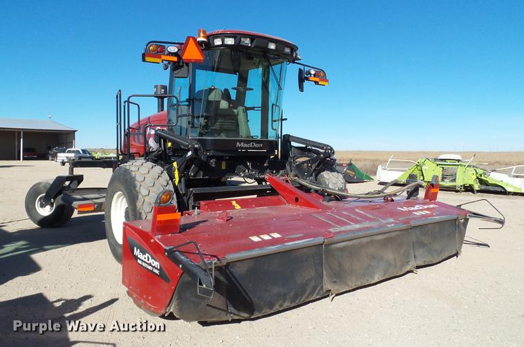 image for item BJ9799 2015 MacDon M205 self-propelled windrower