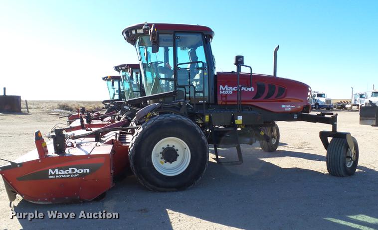 image for item BJ9799 2015 MacDon M205 self-propelled windrower