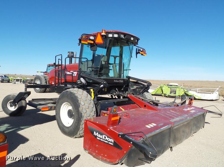 image for item BJ9799 2015 MacDon M205 self-propelled windrower