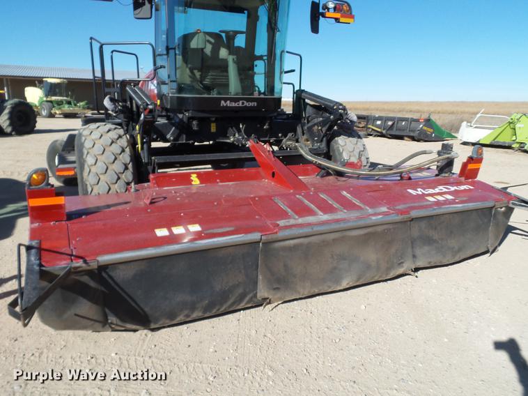 image for item BJ9799 2015 MacDon M205 self-propelled windrower