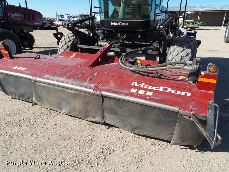 image for item BJ9799 2015 MacDon M205 self-propelled windrower