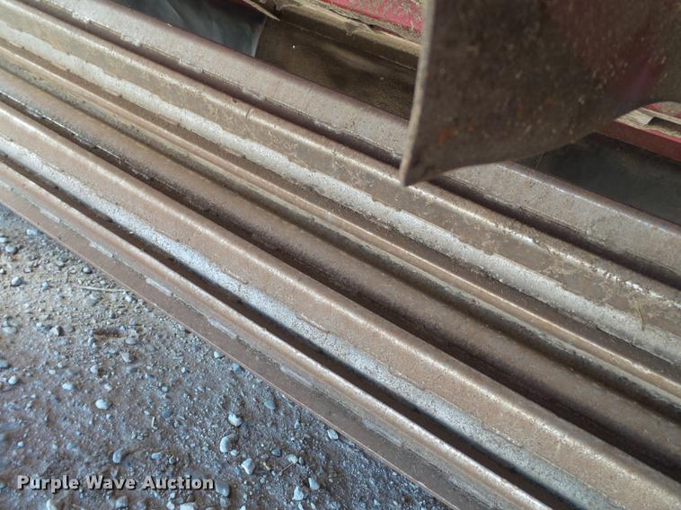 image for item BJ9799 2015 MacDon M205 self-propelled windrower