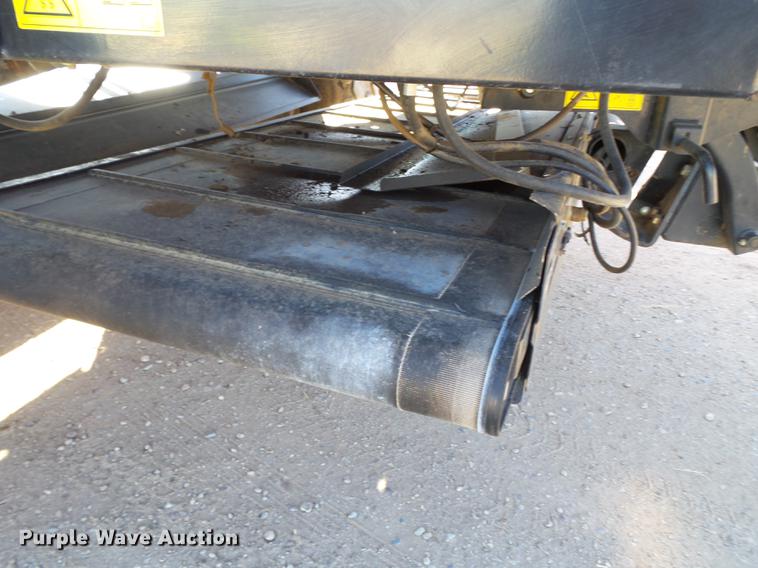 image for item BJ9799 2015 MacDon M205 self-propelled windrower