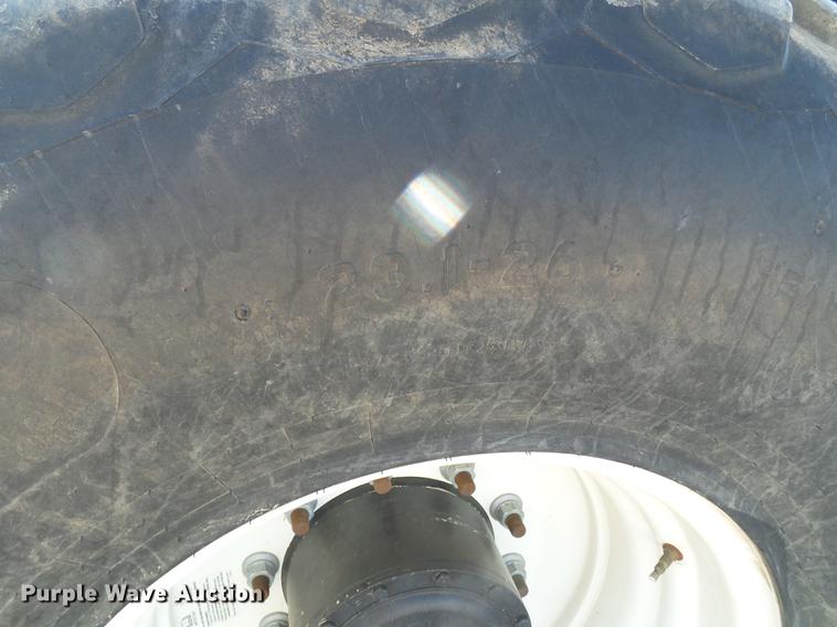 image for item BJ9799 2015 MacDon M205 self-propelled windrower