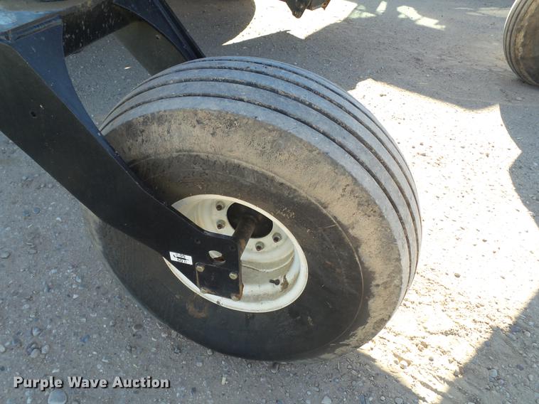 image for item BJ9799 2015 MacDon M205 self-propelled windrower