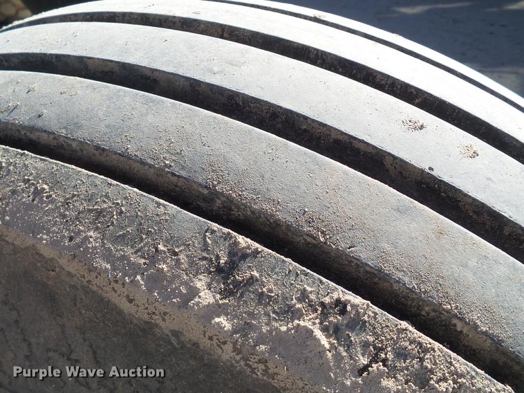 image for item BJ9799 2015 MacDon M205 self-propelled windrower