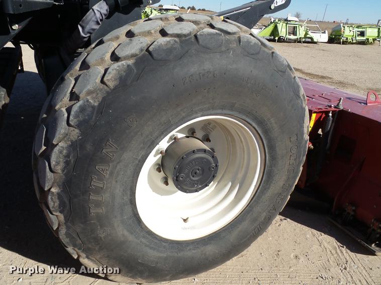 image for item BJ9799 2015 MacDon M205 self-propelled windrower