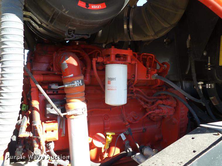 image for item BJ9799 2015 MacDon M205 self-propelled windrower