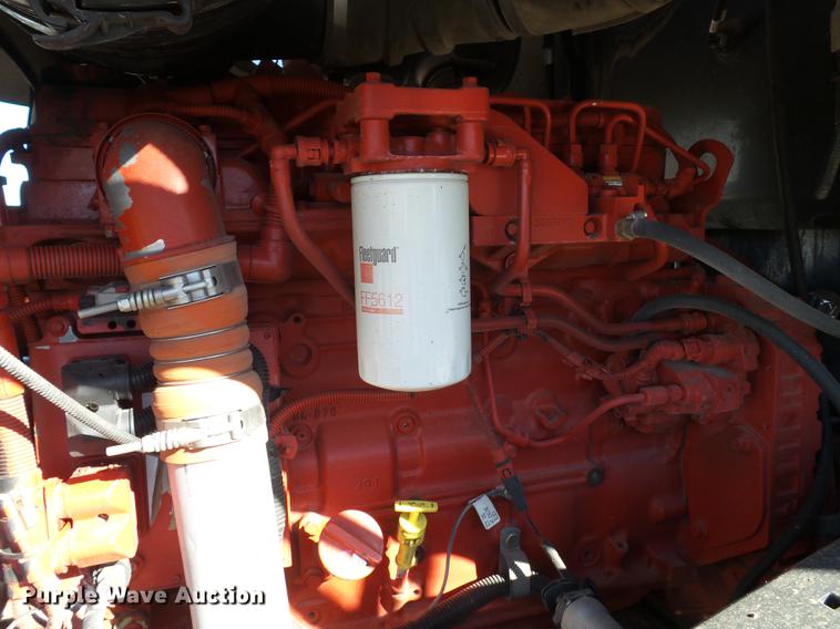 image for item BJ9799 2015 MacDon M205 self-propelled windrower