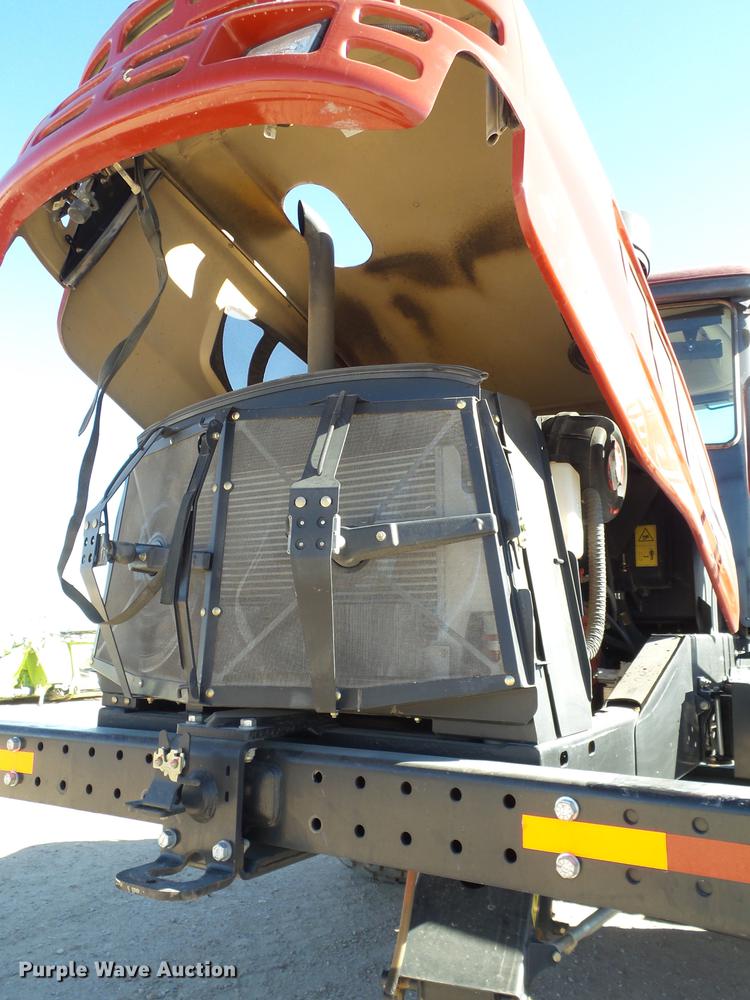 image for item BJ9799 2015 MacDon M205 self-propelled windrower