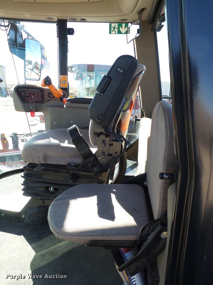 image for item BJ9799 2015 MacDon M205 self-propelled windrower