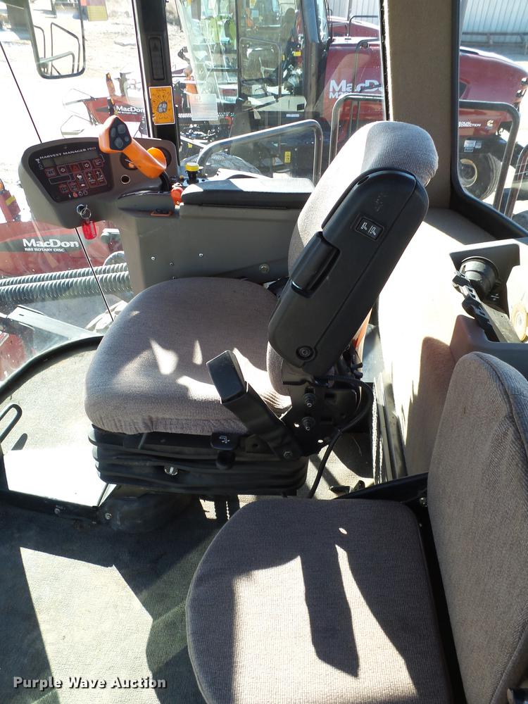 image for item BJ9799 2015 MacDon M205 self-propelled windrower