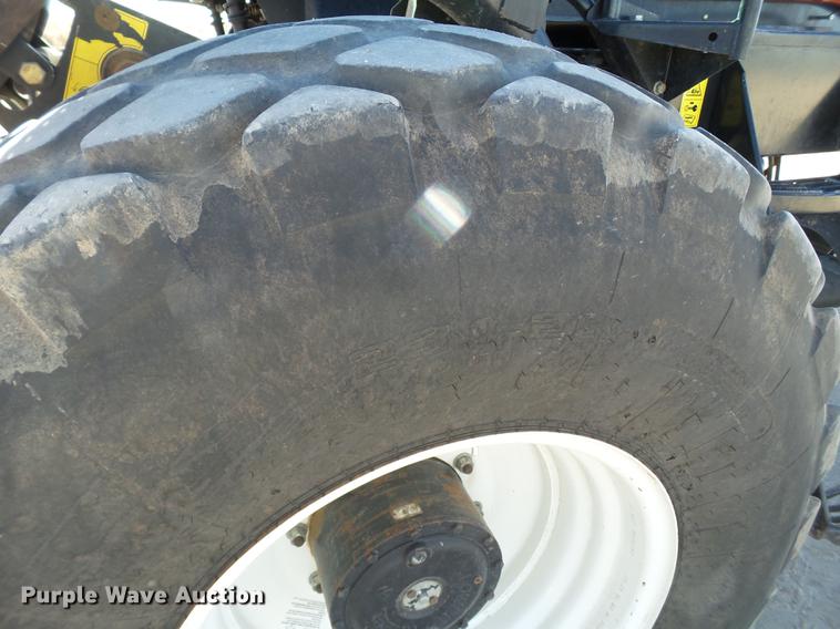 image for item BJ9828 2013 MacDon M205 self-propelled windrower