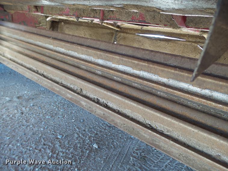 image for item BJ9828 2013 MacDon M205 self-propelled windrower