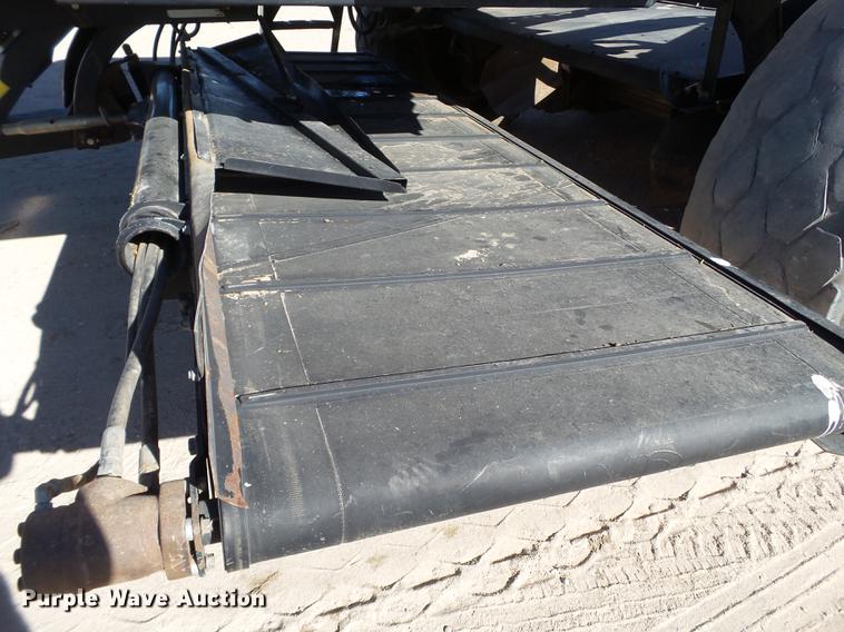 image for item BJ9828 2013 MacDon M205 self-propelled windrower