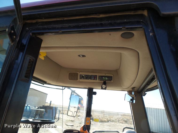 image for item BJ9828 2013 MacDon M205 self-propelled windrower