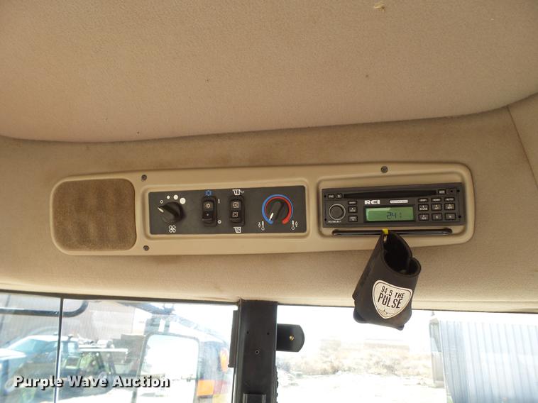 image for item BJ9828 2013 MacDon M205 self-propelled windrower