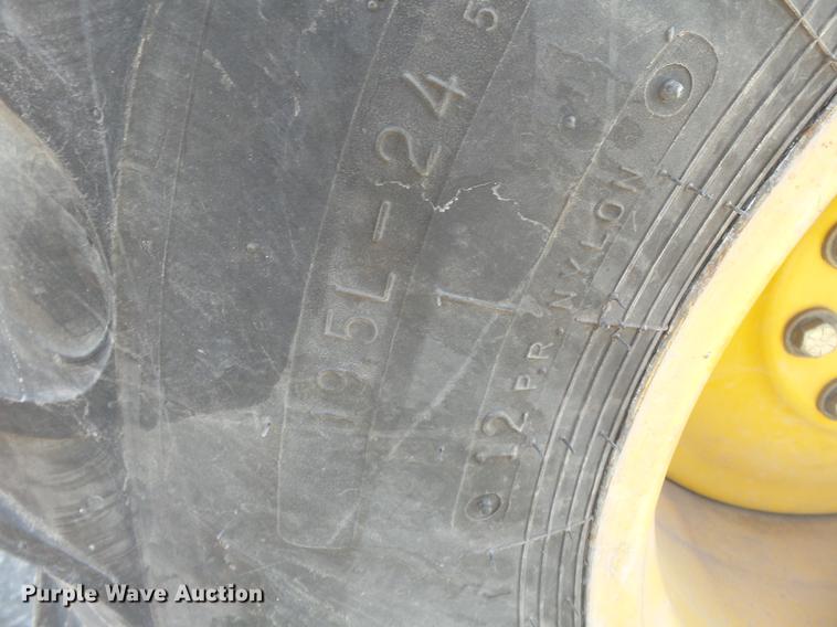 image for item DB7212 2003 John Deere 310SG backhoe