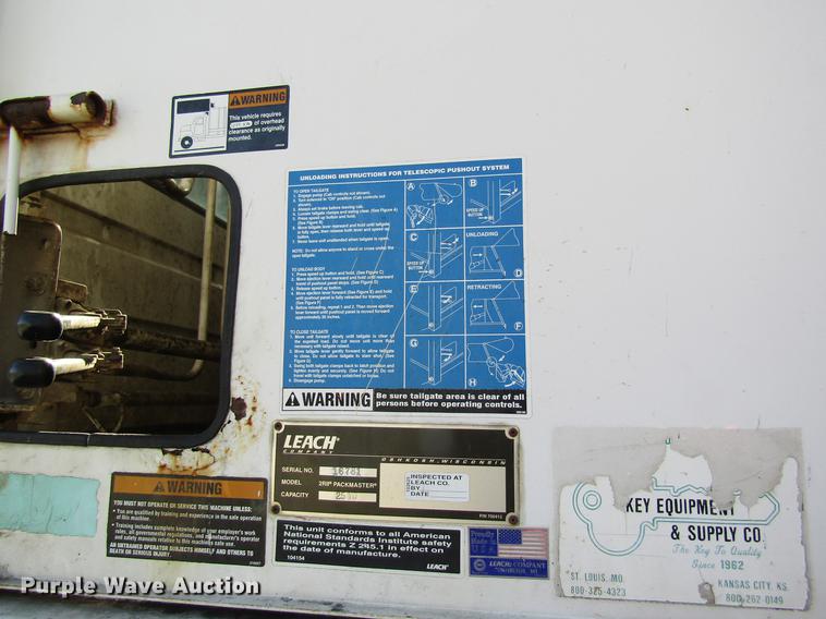 image for item DB9773 2002 Freightliner FL80 refuse truck