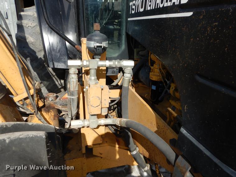 image for item DC0259 2000 New Holland TS110 MFWD tractor