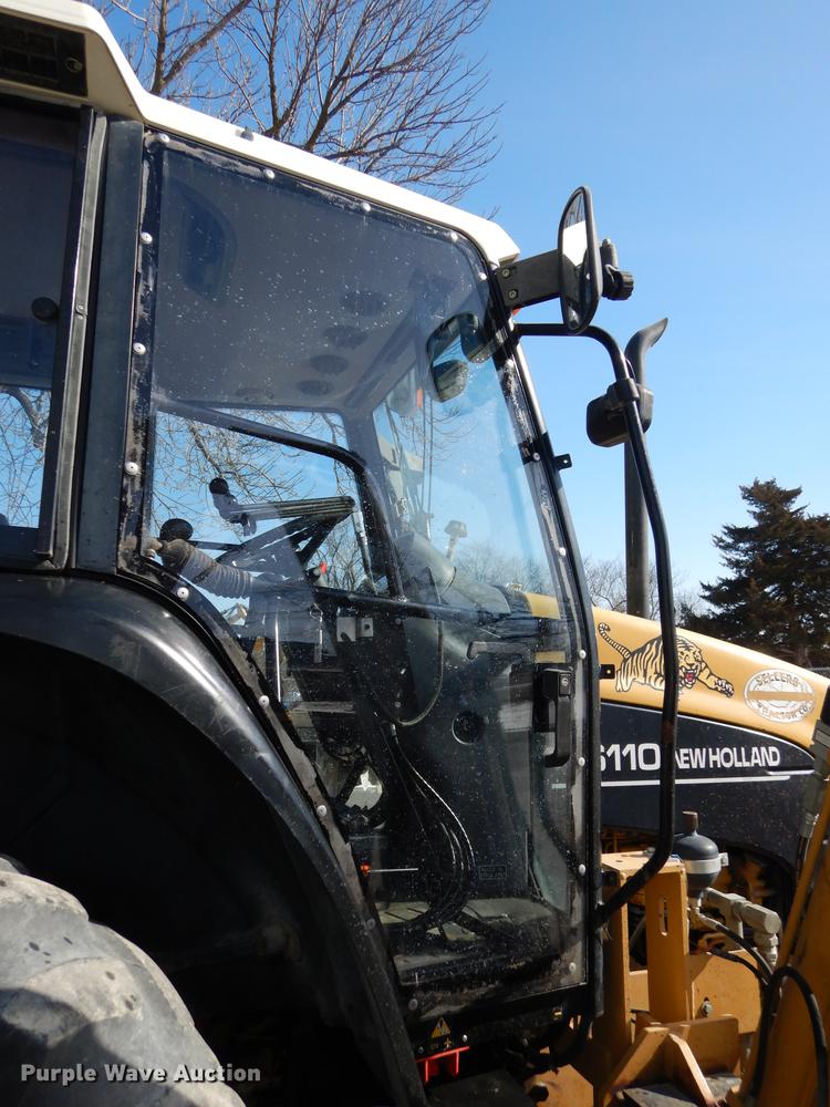 image for item DC0259 2000 New Holland TS110 MFWD tractor