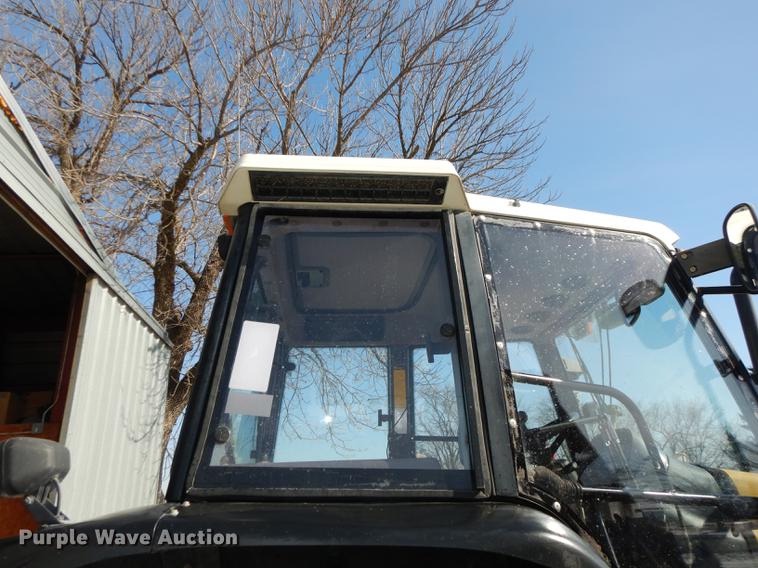 image for item DC0259 2000 New Holland TS110 MFWD tractor