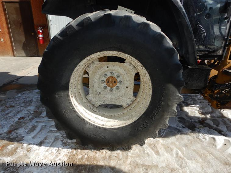 image for item DC0259 2000 New Holland TS110 MFWD tractor