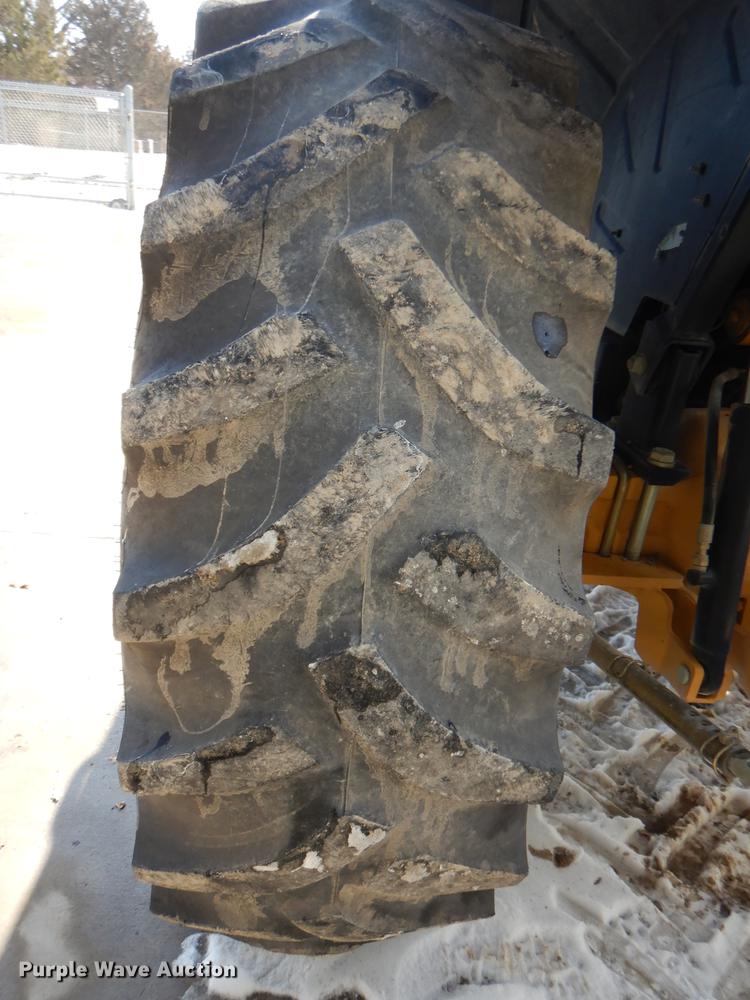 image for item DC0259 2000 New Holland TS110 MFWD tractor