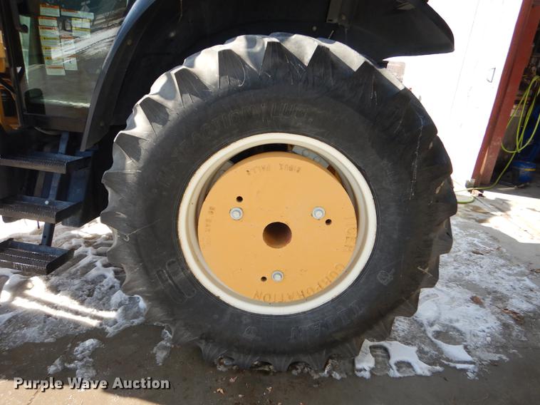 image for item DC0259 2000 New Holland TS110 MFWD tractor