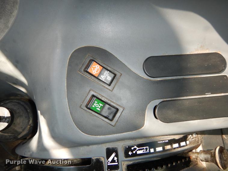 image for item DC0259 2000 New Holland TS110 MFWD tractor