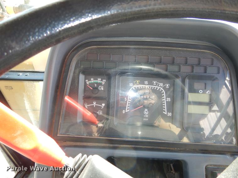 image for item DC0259 2000 New Holland TS110 MFWD tractor