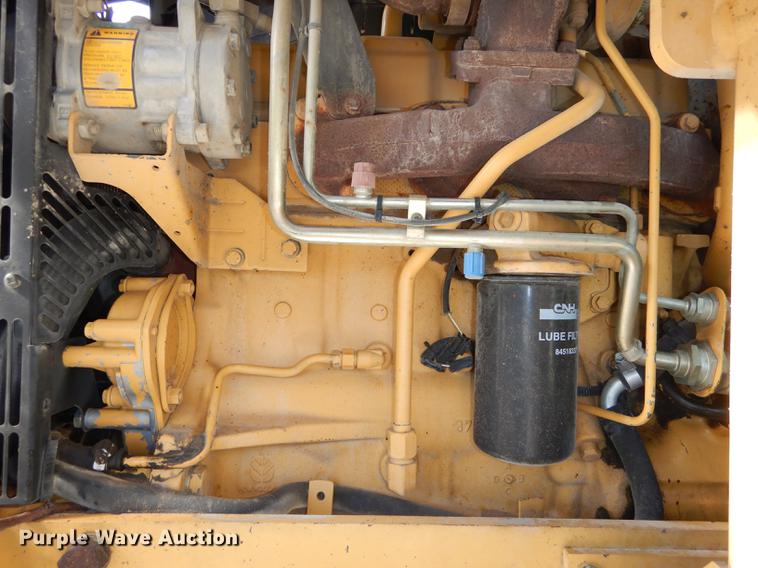 image for item DC0259 2000 New Holland TS110 MFWD tractor