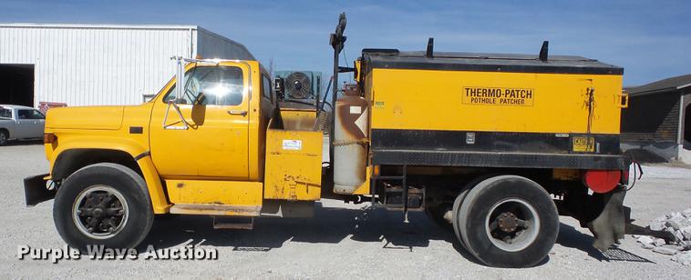 image for item K6284 1990 Chevrolet Kodiak 70 pothole patching truck