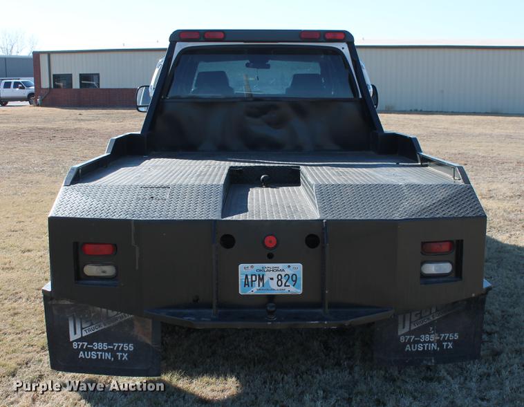 image for item DB5095 1999 Ford F450 Super Duty XLT Crew Cab flatbed truck