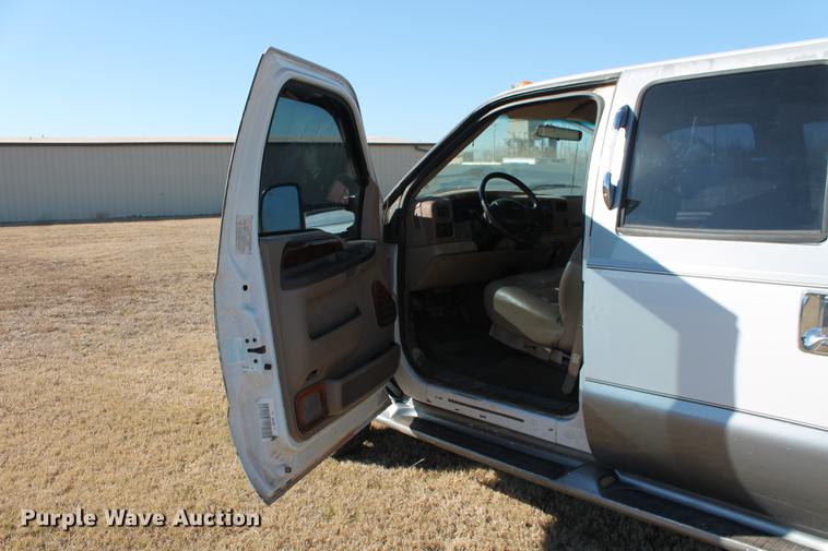 image for item DB5095 1999 Ford F450 Super Duty XLT Crew Cab flatbed truck