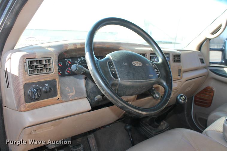 image for item DB5095 1999 Ford F450 Super Duty XLT Crew Cab flatbed truck