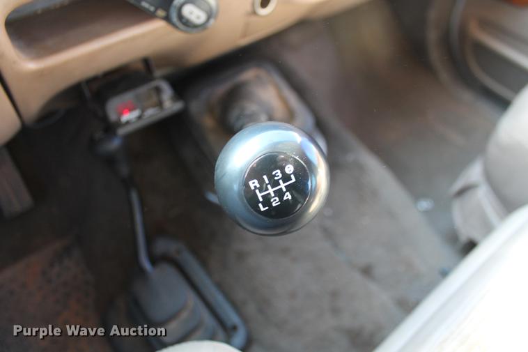 image for item DB5095 1999 Ford F450 Super Duty XLT Crew Cab flatbed truck