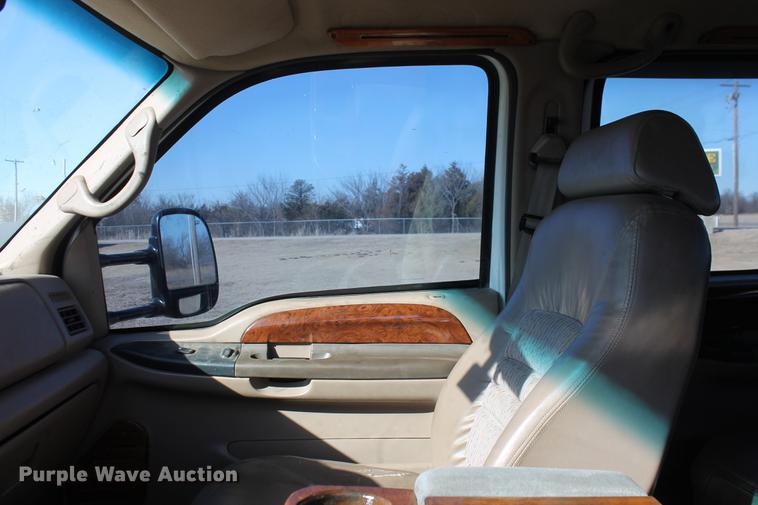 image for item DB5095 1999 Ford F450 Super Duty XLT Crew Cab flatbed truck